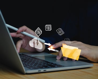 Image showing files migrating from laptop folder to cloud