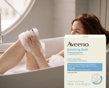 woman taking a bath using Colloidal Oatmeal