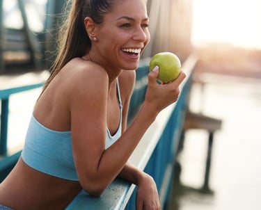 woman holding an apple
