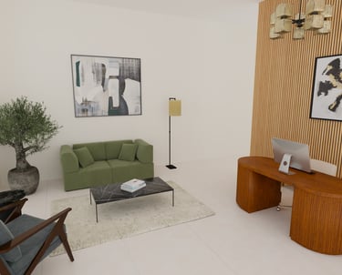 a living room with a green couch and a laptop