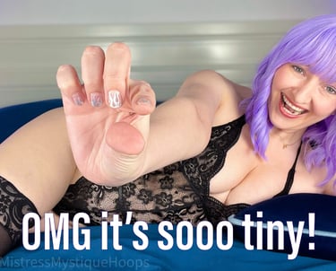 Femdom Mistress in black lingerie saying, "OMG it's so tiny" as small penis humiliation sph