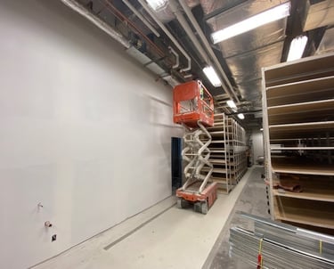 scissor lift inside of storage area