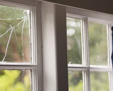 broken glass in timber window