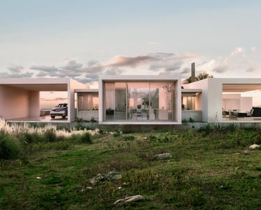 Una casa minimalista de bloques blancos integrada al paisaje y la topografía en Estación del Carmen. Malagueño. Arquitectura