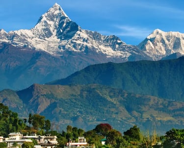 a mountain view of a town with a mountain in the background