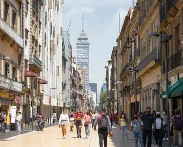 a city street scene with people walking down a street