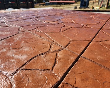 colored and stamped concrete with an Arizona flagstone pattern