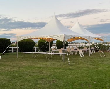 20x49 white tent, outdoor event, tables, chairs