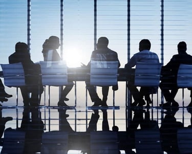 Board room executives sitting at the table