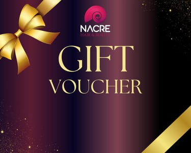 a gift vouchert with a gold ribbon and a bow