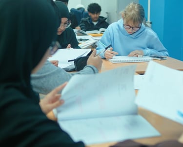 Students improving their English skills with expert tutors at Excel Tutors
