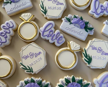 a bunch of cookies decorated in a bridal shower theme