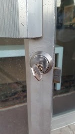 a door handle lock with a key lock on it