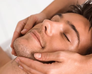 a man getting a massage and skin-care at a spa