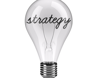 a light bulb bulb with the word strategy on it