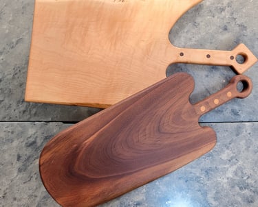 Two handmade cutting boards by J & D Ochoa Woodworking