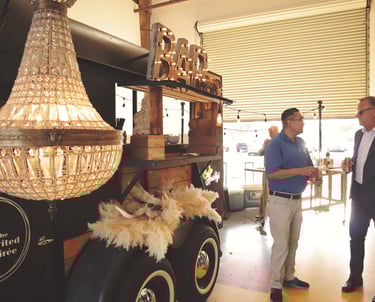 Horse Trailer Bar with men in front