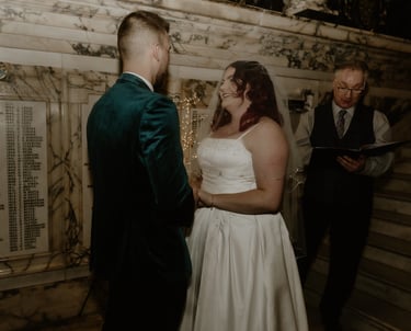 Couple Saying Vows At Their Wedding Ceremony