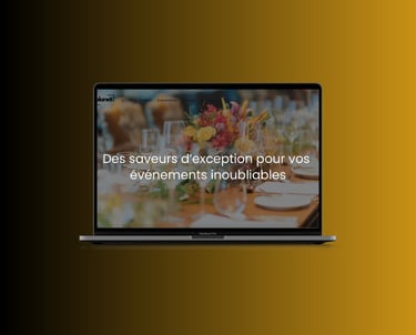 A laptop displaying an event catering website with a floral centerpiece and elegant table setting.