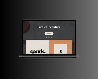 Modern MacBook Pro displaying a creative agency website design with Spark branding and minimalist UI.
