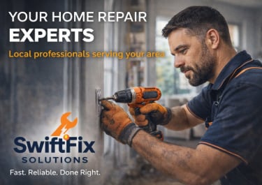 a man in a blue shirt and gloves is holding a drillet