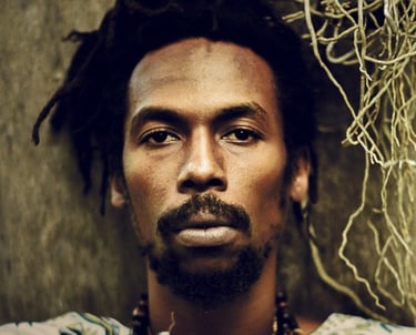 a man with dreadlocks and dreadlocks on his head