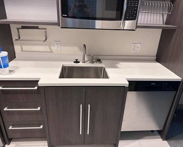 Integrated sink and quartz top with custom vanity cabinets