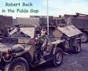 Robert sitting in jeep in army uniform serving at Fulda Gap