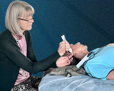 a woman is shown in this picture, practicing healing techniques at the Circle of Chi wellness Center