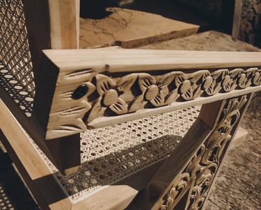 Contemporary chairs made of teak wood and rattan with a combination of distinctive carved ornaments