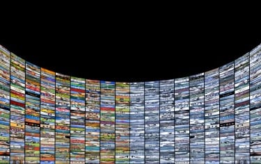 panoramic wall of video screens