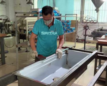 Spitra worker in Factory