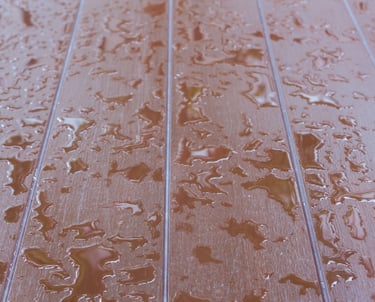 Water damage on hardwood floor in Coupland, TX home after indoor flooding