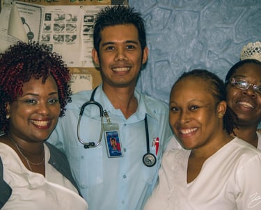 Dr Zaw among three lovely Jamaican Nurses 