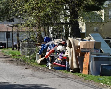 junk piled in front of house in McKinney, TX