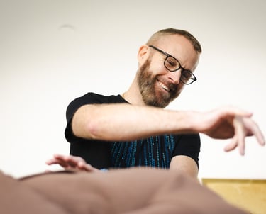 a man energy healing a client clearing throat chakra
