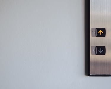 Up and down buttons in front of the Elevator