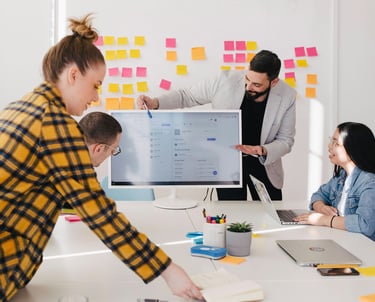Team in a Stand Up Meeting at a Startup