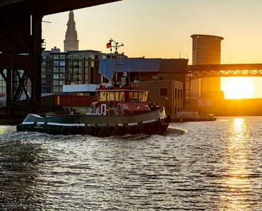 Ohio riverfront with industrial backdrop, showing Buckeye Venture Group’s wholesaling services