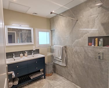 Artisan carreleur à Bruay-La-Buissière / Pose grands formats dans une salle de bain / Carréno