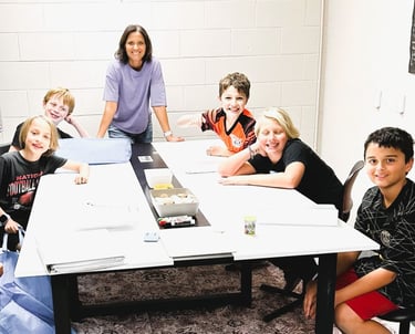 Founder leading math class.