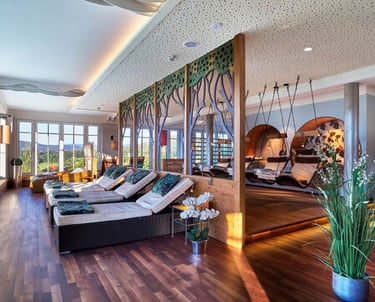 a living room with a couch and a large window