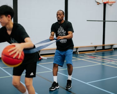 Coach Q training a player during a private lesson