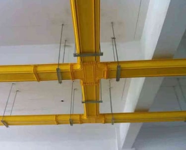 a ceiling with a yellow fiber cabler tray systems