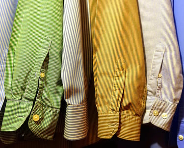 Photo by Mike Bird close up of dress shirt sleeves