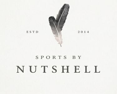 A minimalist logo with two dark feathers, the text 'SPORTS BY NUTSHEL' below, and 'ESTD 2014' on a light background