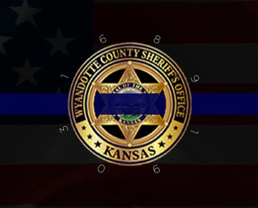 Tribute graphic recognizing fallen sheriff’s deputies in Wyandotte County with badge and thin blue line imagery.