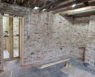 Exposed interior walls during a home renovation/electrical rewire. 1st fix completed by RAD Energise