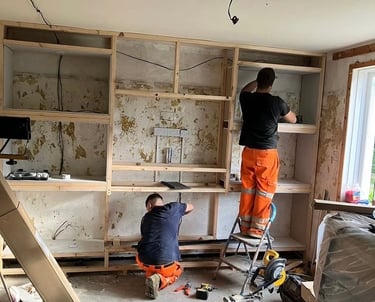 Roman Refurb team using carpentry and joinery skills to build a media centre
