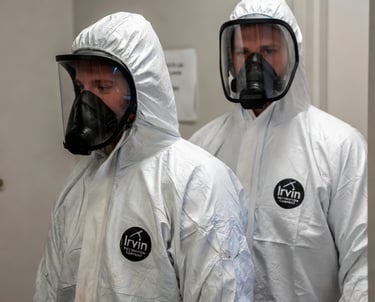 Irvin Restoration technicians in protective gear - 24/7 emergency property damage response Irving TX